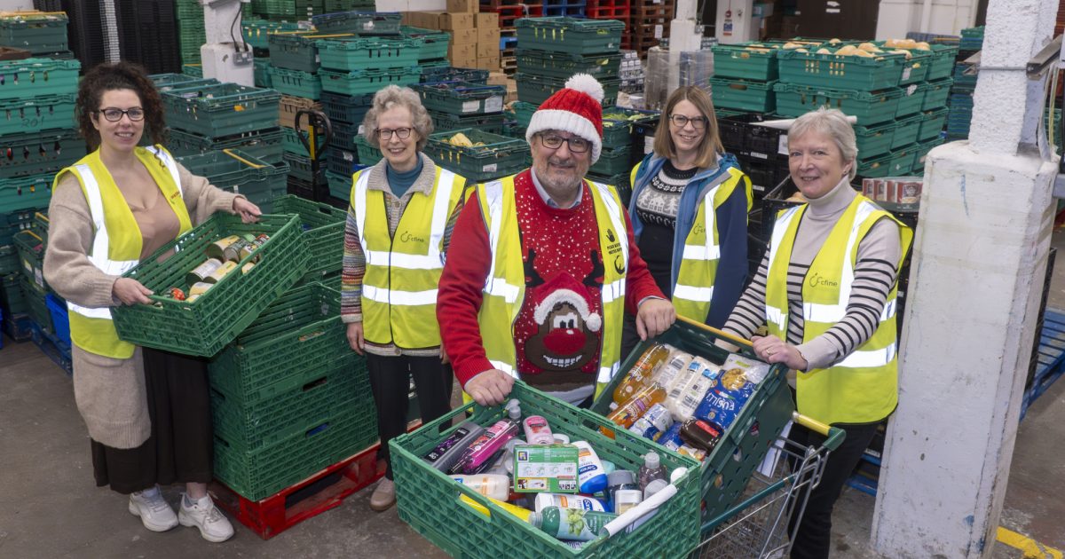 OpenGraph Image for Anti-Poverty and Inequality Committee members volunteer at CFINE