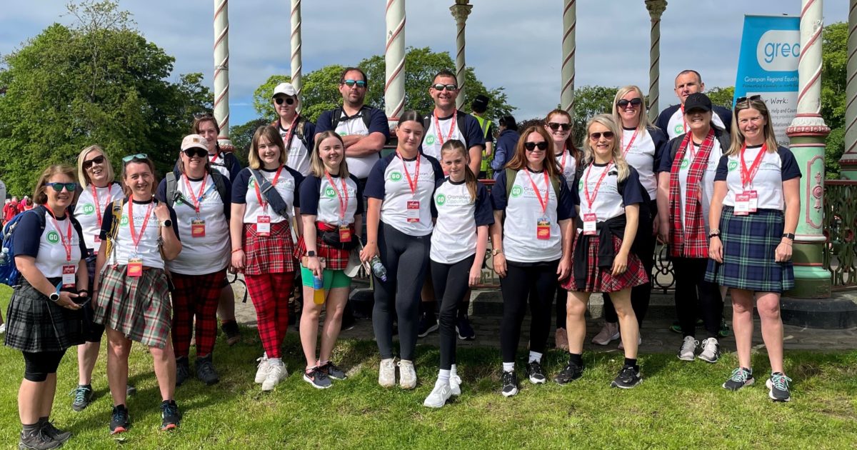 OpenGraph Image for KR Group don tartan and trainers to raise funds for local charity