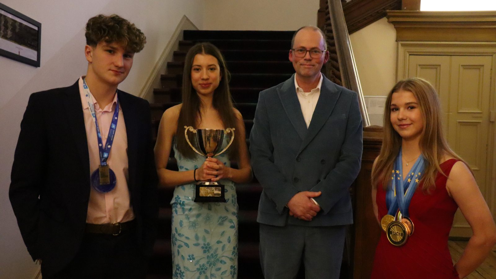 Former Lathallan pupil and World Champion swimmer Dean Fearn; current S6 pupil and Scottish hillrunner Hania; Headmaster Richard Toley; and World Champion cyclist Arabella Blackburn. Photo credit - Lathallan School