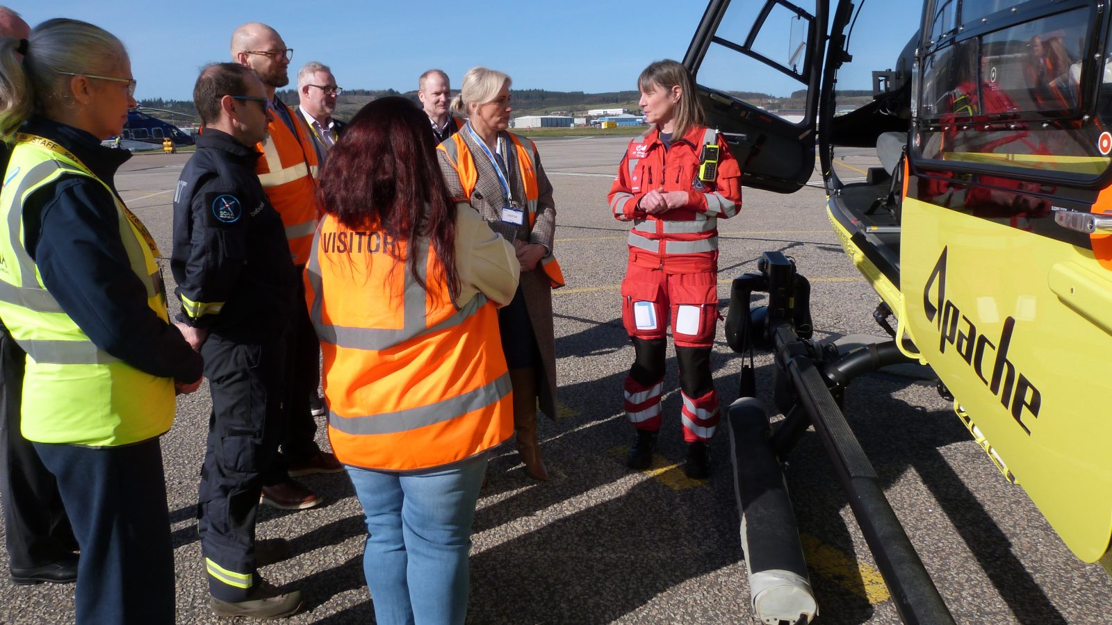 Members of Apache's Bond committee learn more about SCAA during a recent base visit.