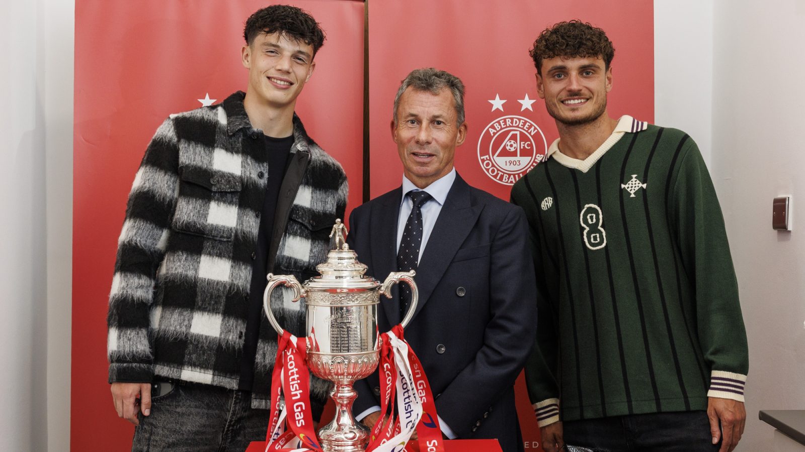 Jack Milne, Gary Walker and Dante Polvara with the Scottish Cup.