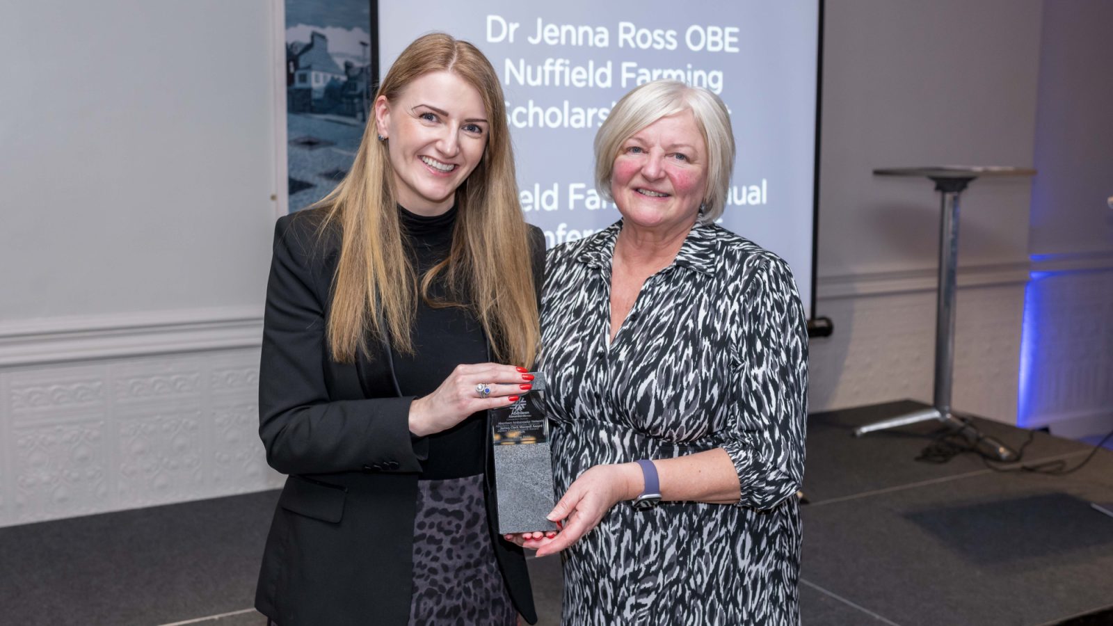 Dr Jenna Ross OBE receiving the 2026 James Clark Maxwell Award from Fiona Anderson from category sponsor Northlink Ferries.