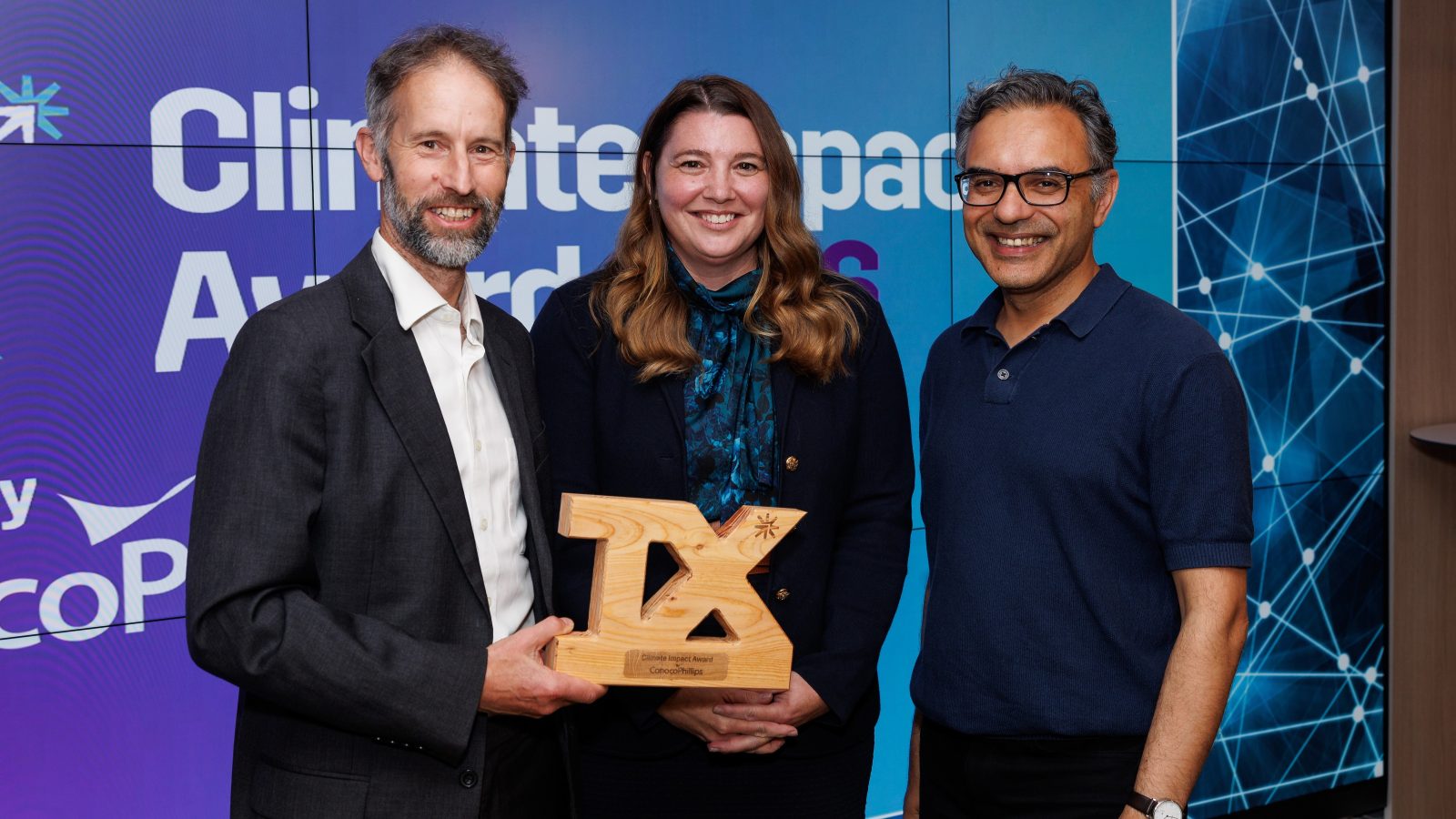 Donald Naylor, CTO of Orchid Solar, who presented, and winning the prize with Renee Omsberg Rosener, Global Technology Manager for ConocoPhillips, and Parag Vyas, CEO of Orchid Solar.