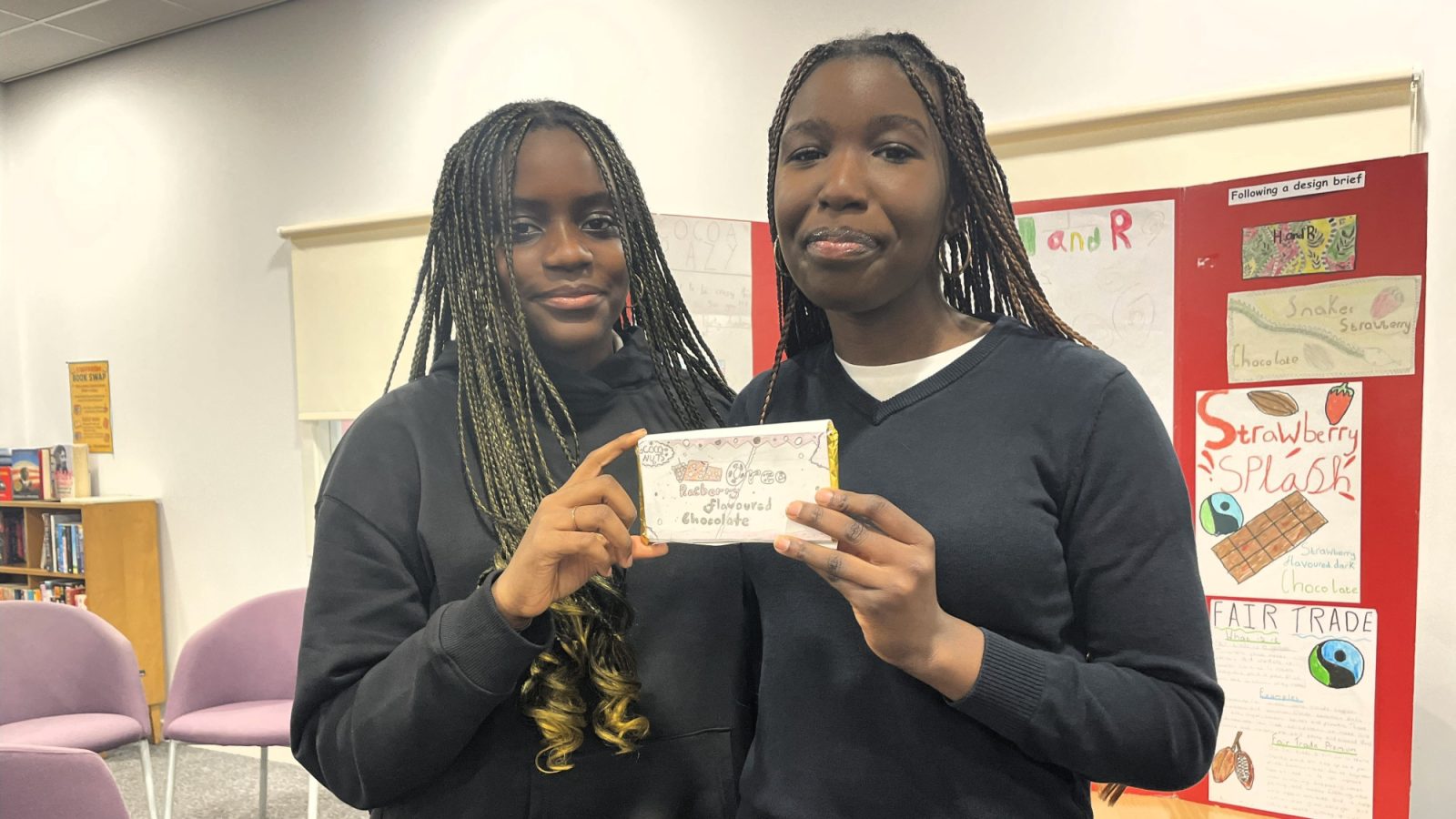 Pupils Mya Harrison (left) and Jovanna Ossai with their completed chocolate bar.