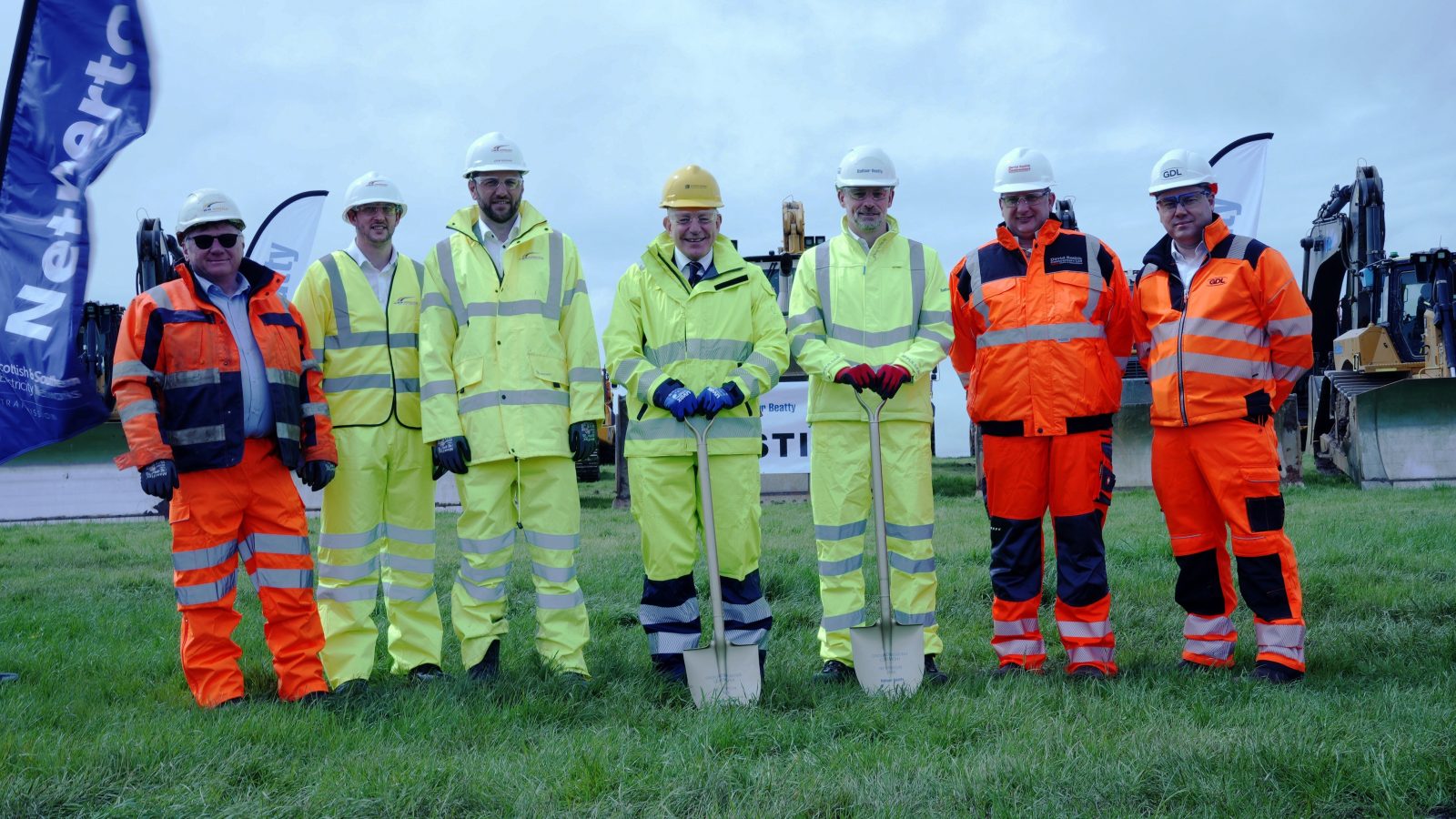 Sandy MacTaggart and Nick Rowan (centre left and right respectively, with shovels) with Managing Directors from local businesses helping deliver the Netherton Hub