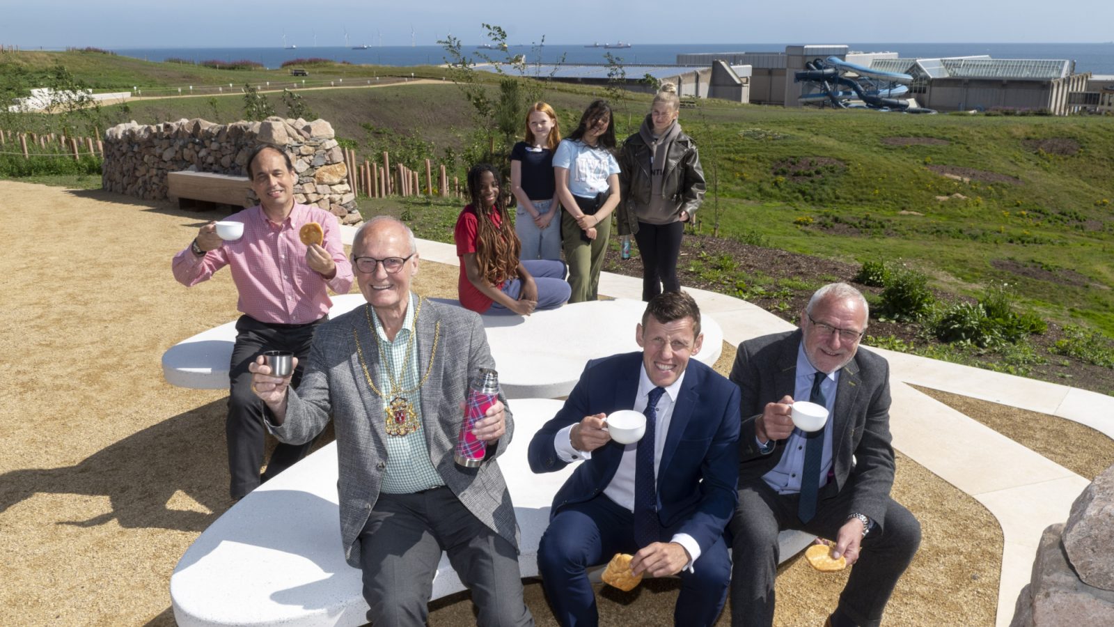Cllr Martin Greig, the Lord Provost Dr David Cameron, Richard Park, chief executive of hub North Scotland, and Graeme Lawtie, Operations Director, Robertson Construction Eastern, with some of the Young Ambassadors in the background, on one of the viewing platforms at the new-look Broadhill