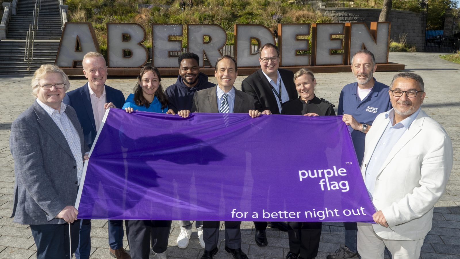 Photo caption (from Left to Right): Councillor Ian Yuill, Co-Leader of Aberdeen City Council; Adrian Watson, CEO, Aberdeen Inspired; Christina Schmid, President, University of Aberdeen Student Association; Bryan Uyiosa-Igbinigie, Robert Gordon University (RGU) Student President (Communication & Democracy); Councillor Martin Greig, Aberdeen City Council; Mark Wilson, Community Safety Manager, Aberdeen City Council; Chief Inspector Vicky Stables, Police Scotland; Peter Turner, Chair, Street Pastors; and Councillor Christian Allard, Co-Leader of Aberdeen City Council.