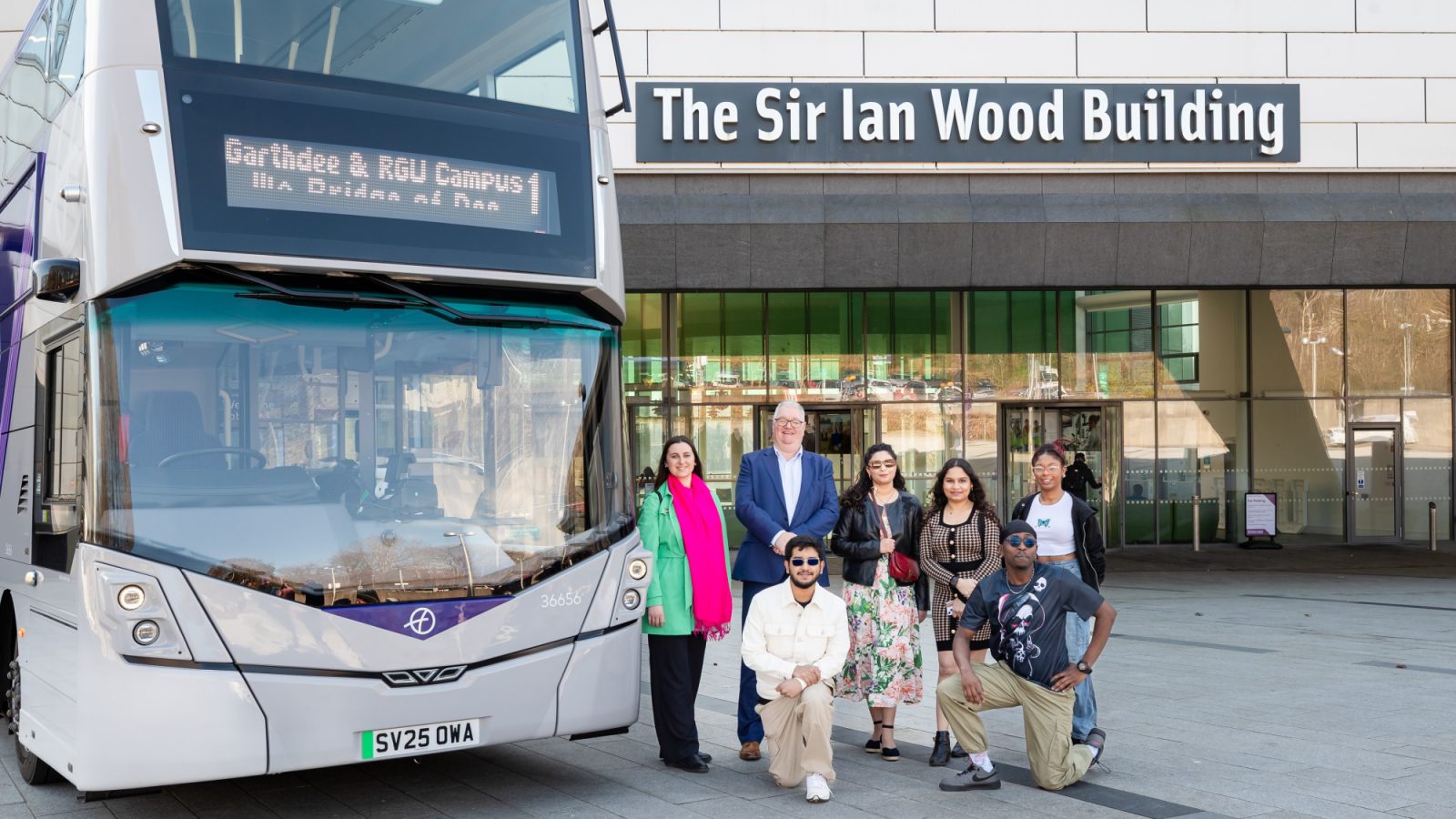 David Adam, operations manager at First Aberdeen, with students from Robert Gordon University
