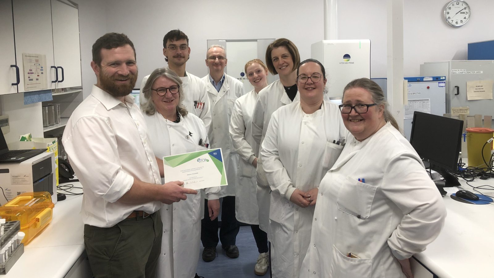 Michael (far left) and Marion (far right) with members of the labs team at Aberdeen Royal Infirmary