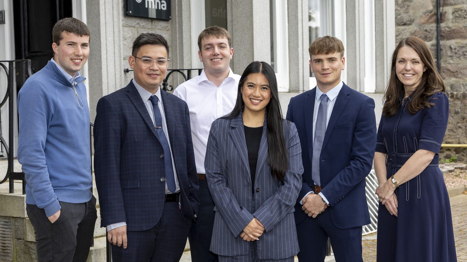 Class of 2025 - From left, Connor Sherrit, Cedie Herrera, Findlay Stewart, Claudette Castrence, James Dempster, with senior manager Louise Smith