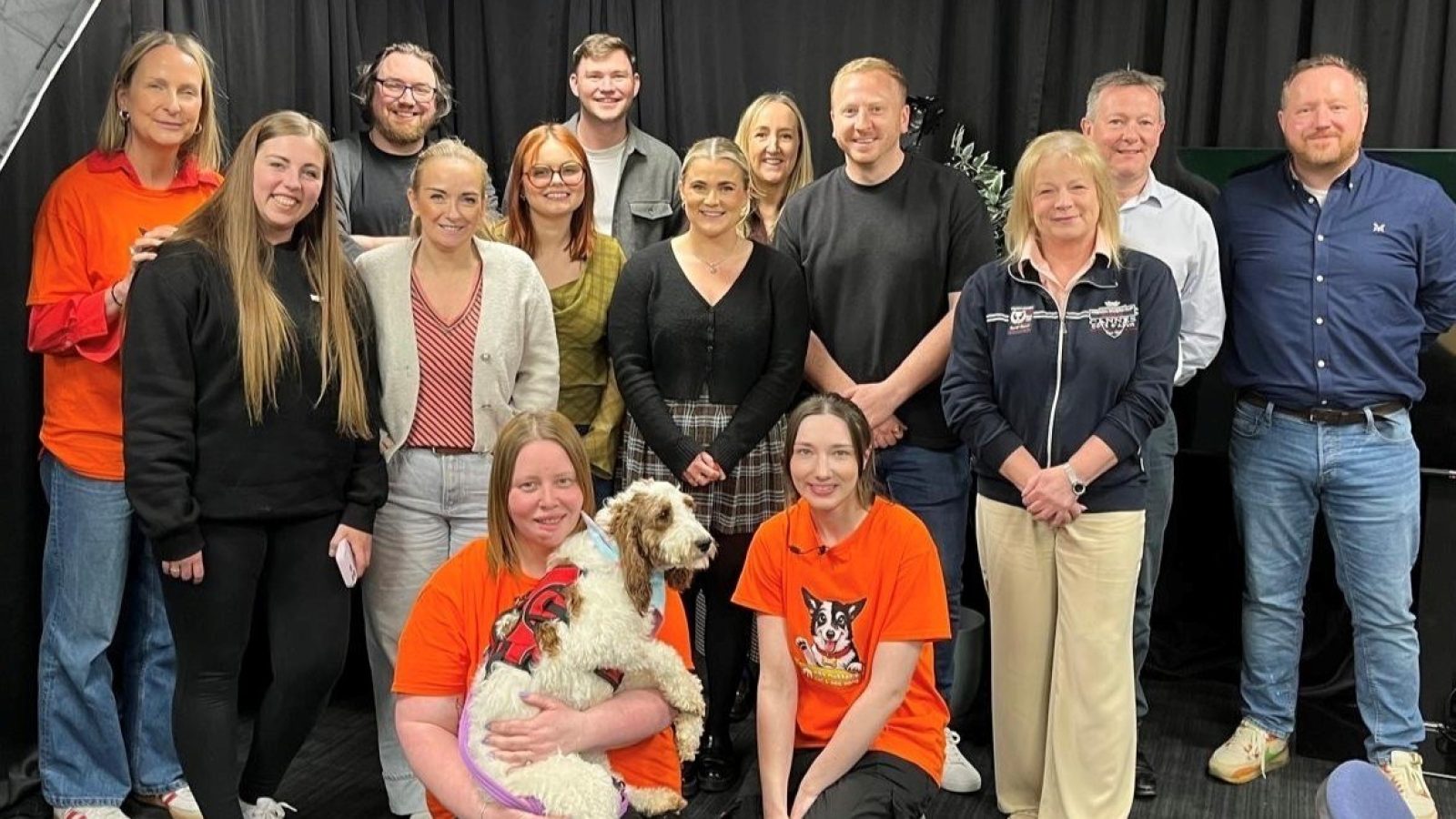 Some of the Mearns & Gill team who are taking part in this year’s running challenge, along with (at the front in orange t shirts), Stacey and Laura from Mrs Murray’s and Evie the dog, one of their residents.