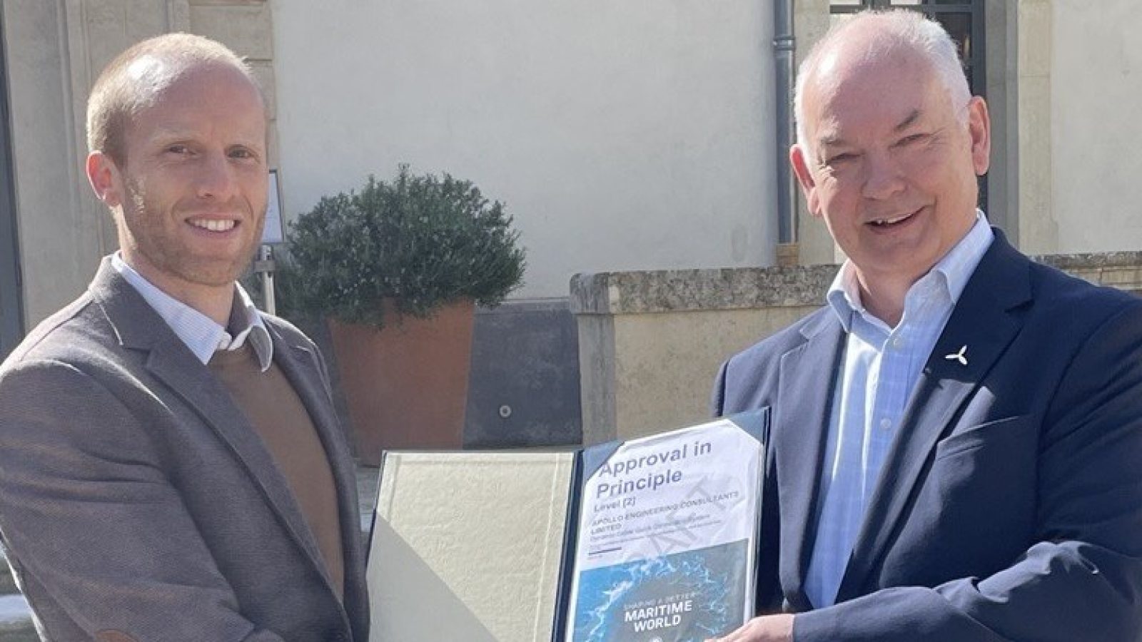 Nigel Robinson, Marine Energies Director at Apollo, receives the PALM QCS Approval in Principle (Level 2) certificate from Jonathan Boutrot, Market Leader – Marine Renewable Energies at Bureau Veritas.