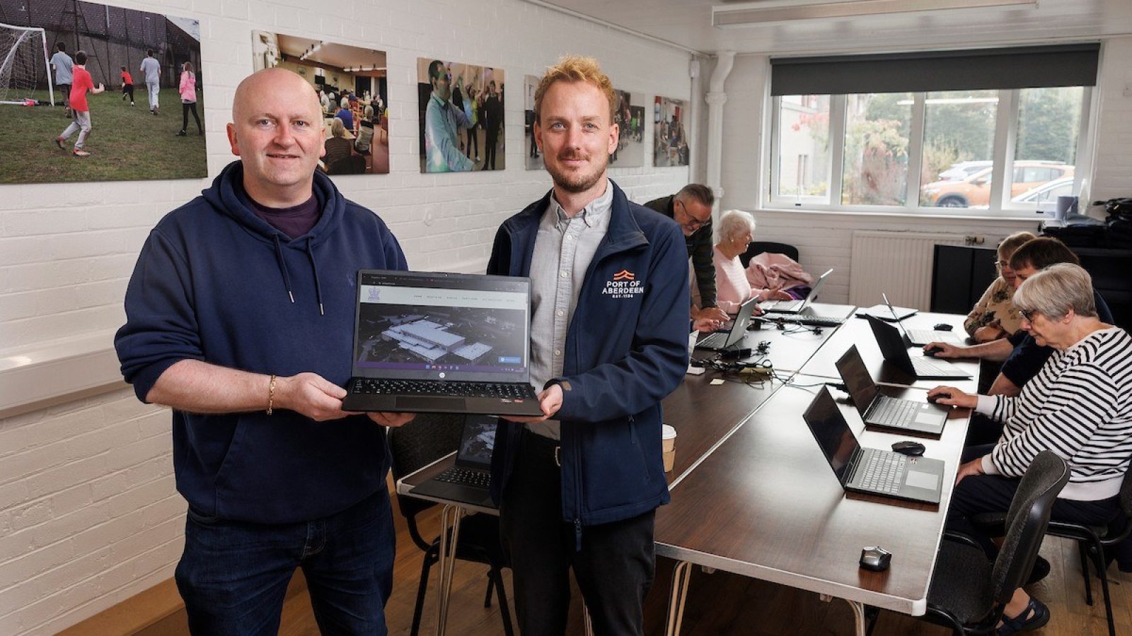 Jordan Harkins, Head of Communications, Port of Aberdeen with Paul O’Connor MBE, Chairman and Manager, Inchgarth Community Centre.