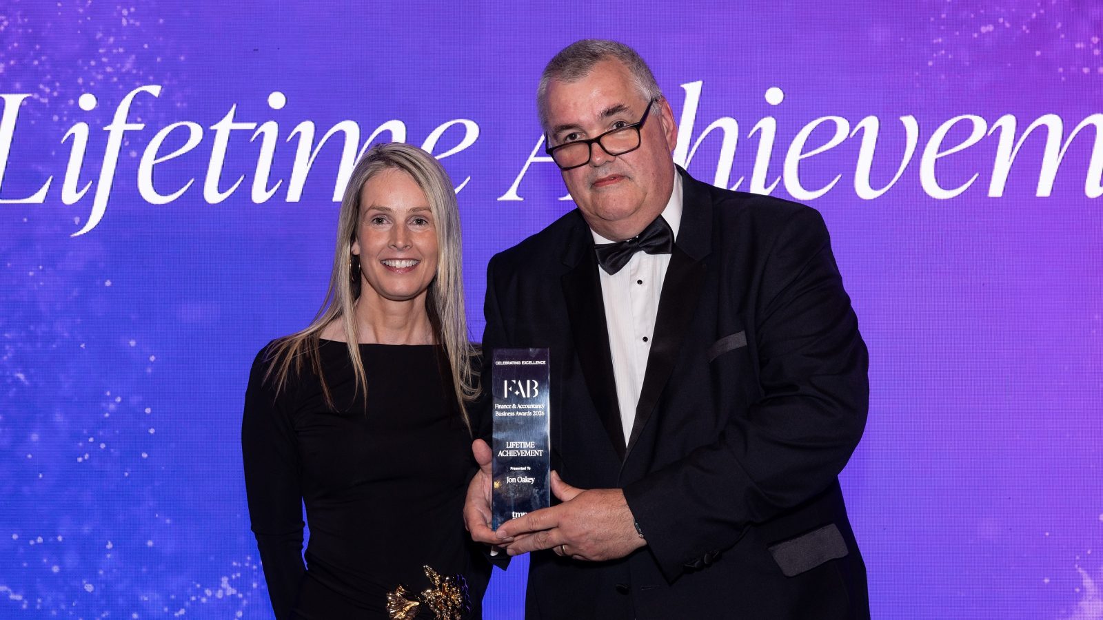 1)	Recently retired Port of Aberdeen Chief Financial Officer Jon Oakey with Amanda McCulloch, Chief Executive, TMM Recruitment