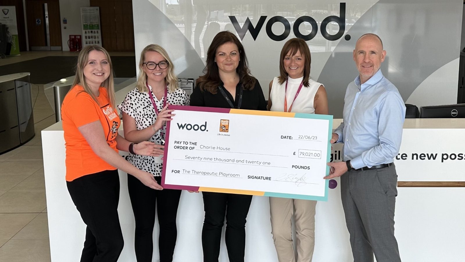 Jenna Simpson from Charlie House with Michelle Drummond, Caroline McMurray, Barbara Polson and Craig Shanaghey from Wood.