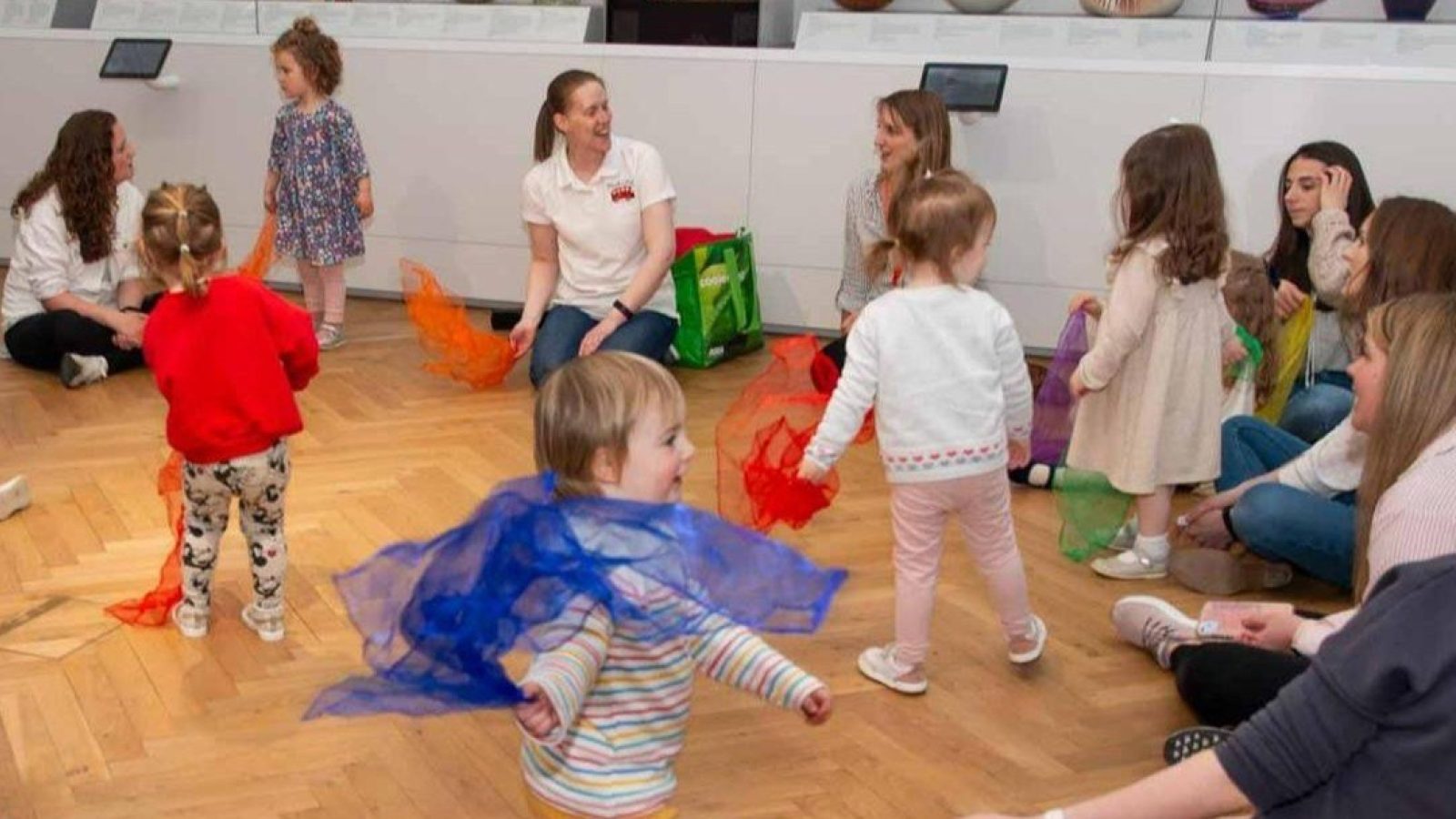 Young visitors enjoying a playful Musical Bus session in the Art Gallery