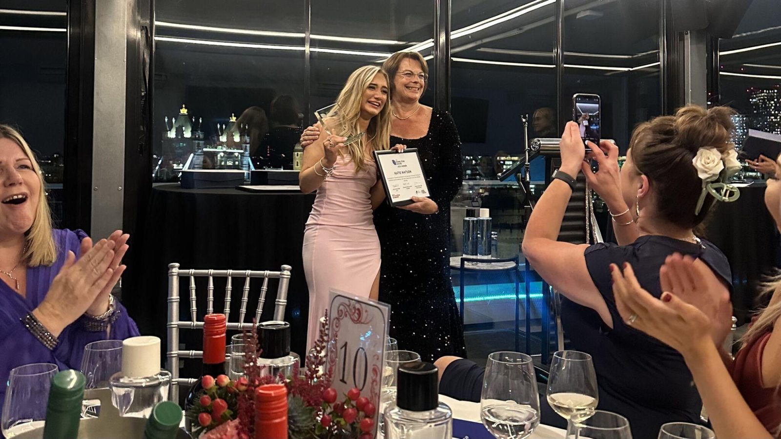 Katie Watson collecting her Rising Star Award.