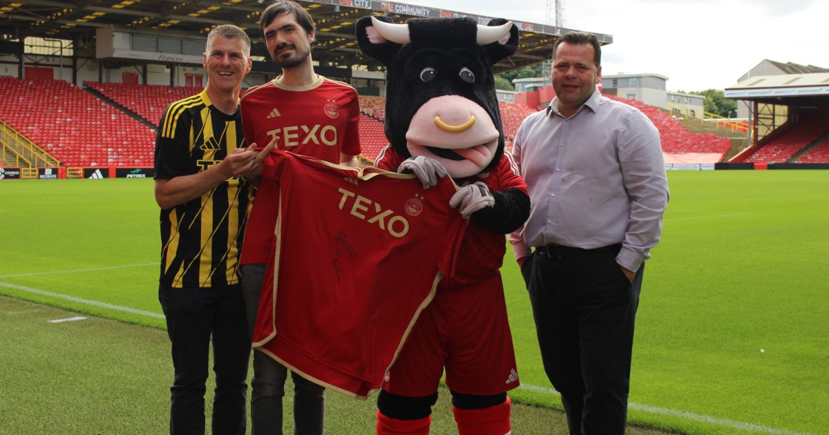 OpenGraph Image for Dons hero Angus donates rare signed shirt for quiz night auction to help Camphill School