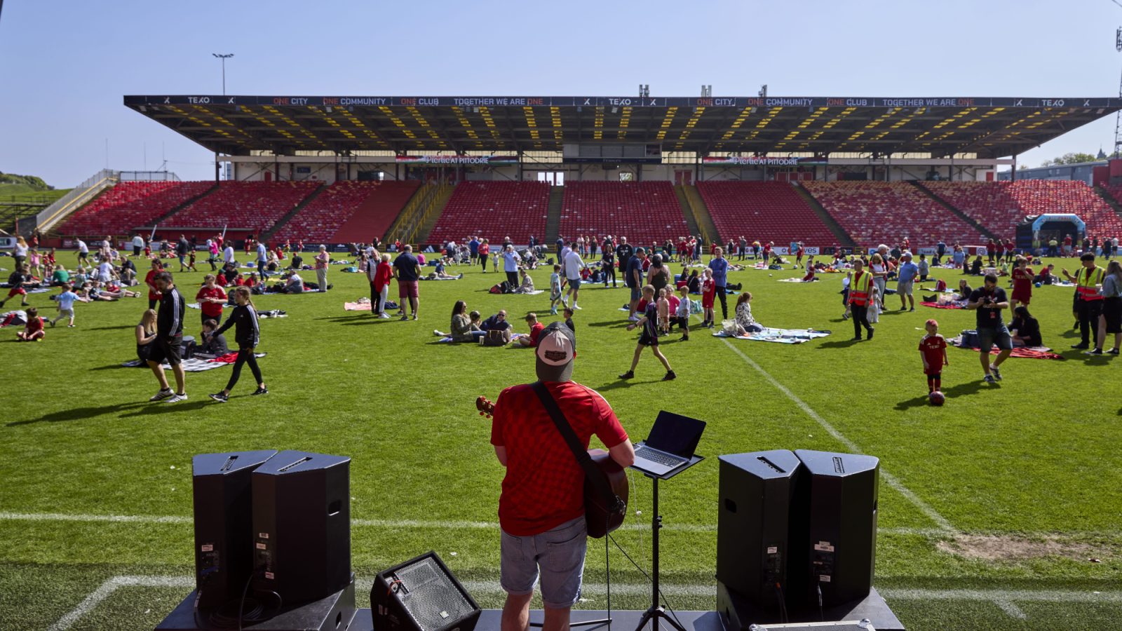 Picnic on the pitch is a winner as families enjoy fun in the sun