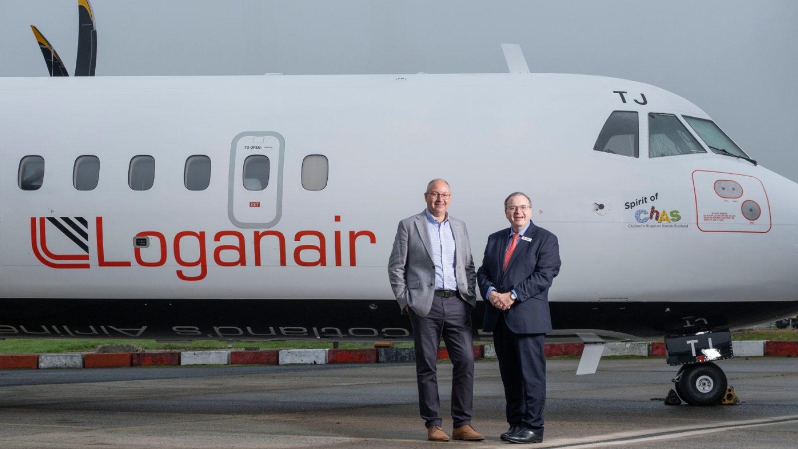 Loganair marks four-year partnership with CHAS with aircraft naming